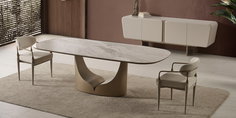 Modern oval seramik tablalı yemek masası ve döşemeli sandalyelerden oluşan şık bir yemek odası takımı. Uygun Fiyatlı inegöl mobilya seçenekleriyle evinize değer katın.