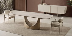 Minimalist oval seramik masalı ve bej renk döşemeli sandalyeleriyle modern yemek odası takımı. En uygun İnegöl mobilya Fiyatları.
