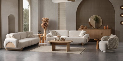 Panama Koltuk Takımı, modern tasarımlı iki krem rengi sofa ve tekli koltuktan oluşan, doğal ahşap detaylarla zenginleştirilmiş oturma odası takımı. Uygun Fiyatlı inegöl mobilya arayanlar için şık ve konforlu bir seçenek.