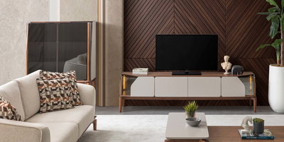 Modern yaşam alanları için tasarlanmış, ceviz ve ekru renklerin harmonisiyle öne çıkan Lotus Tv Ünitesi. Kaliteli İnegöl mobilya işçiliğiyle estetik ve fonksiyonellik bir arada.