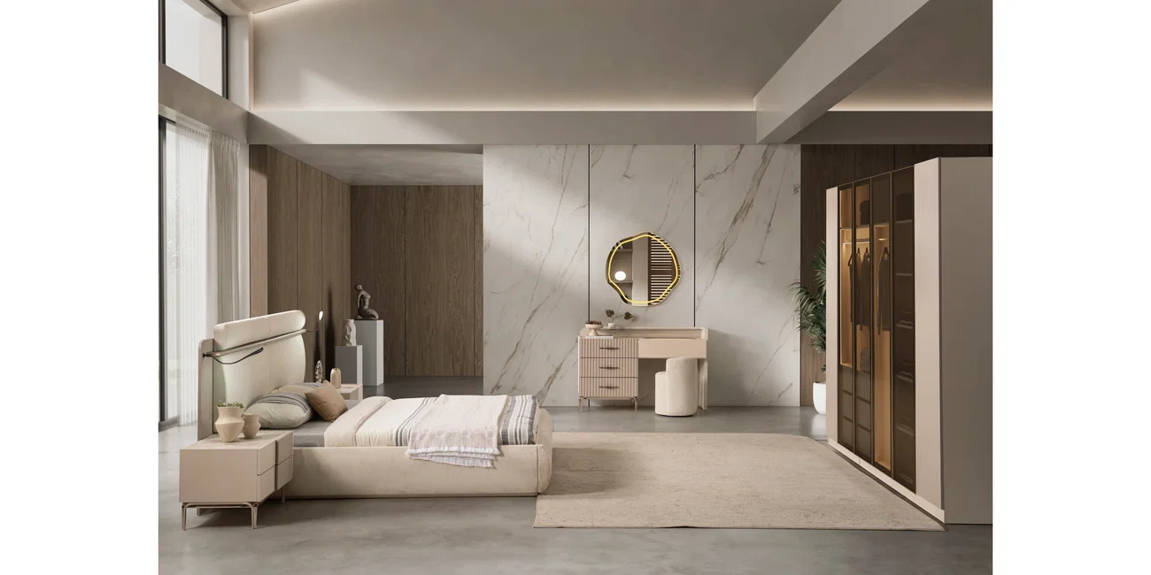 Modern Megaron Yatak Odası Takımı, konforlu bej yatağı, komodinleri, aydınlatmalı makyaj masası, gold detaylı aynası ve cam kapaklı gardırobuyla dikkat çekiyor. En cazip inegöl mobilya kampanyaları ile evinize şıklık katın.