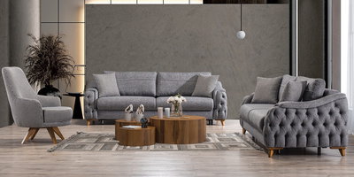 Gri chesterfield ve modern detaylı Arya Koltuk Takımı, ahşap sehpalar ve houndstooth berjer ile şık salon. İnegöl mobilya Fiyatları.