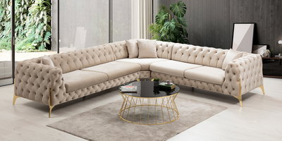 Modern salonlara özel bej Fantom Köşe Koltuk Takımı, gold detaylar ve chesterfield kapitone tasarımıyla şıklığı evinize taşıyor. Uygun Fiyatlı inegöl mobilya seçenekleriyle konforu yakalayın.