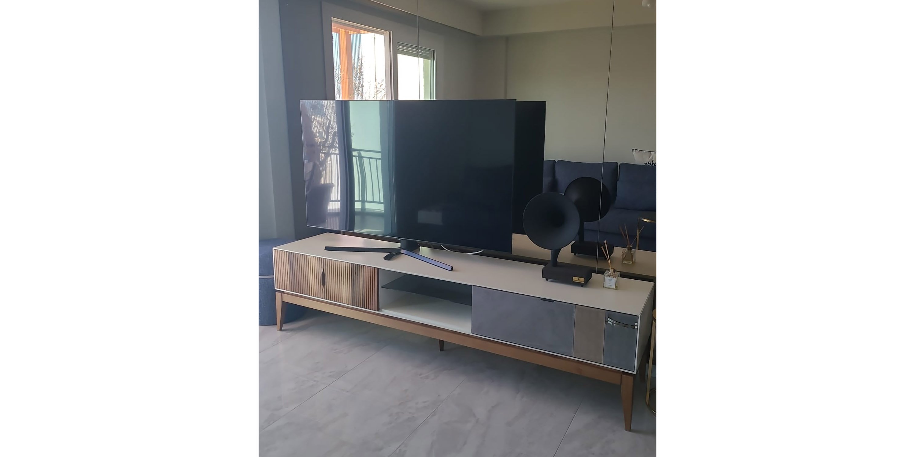 Modern and stylish Ismail Yuruk Mugla TV unit, reflecting Bursa furniture quality with natural wood and white details.