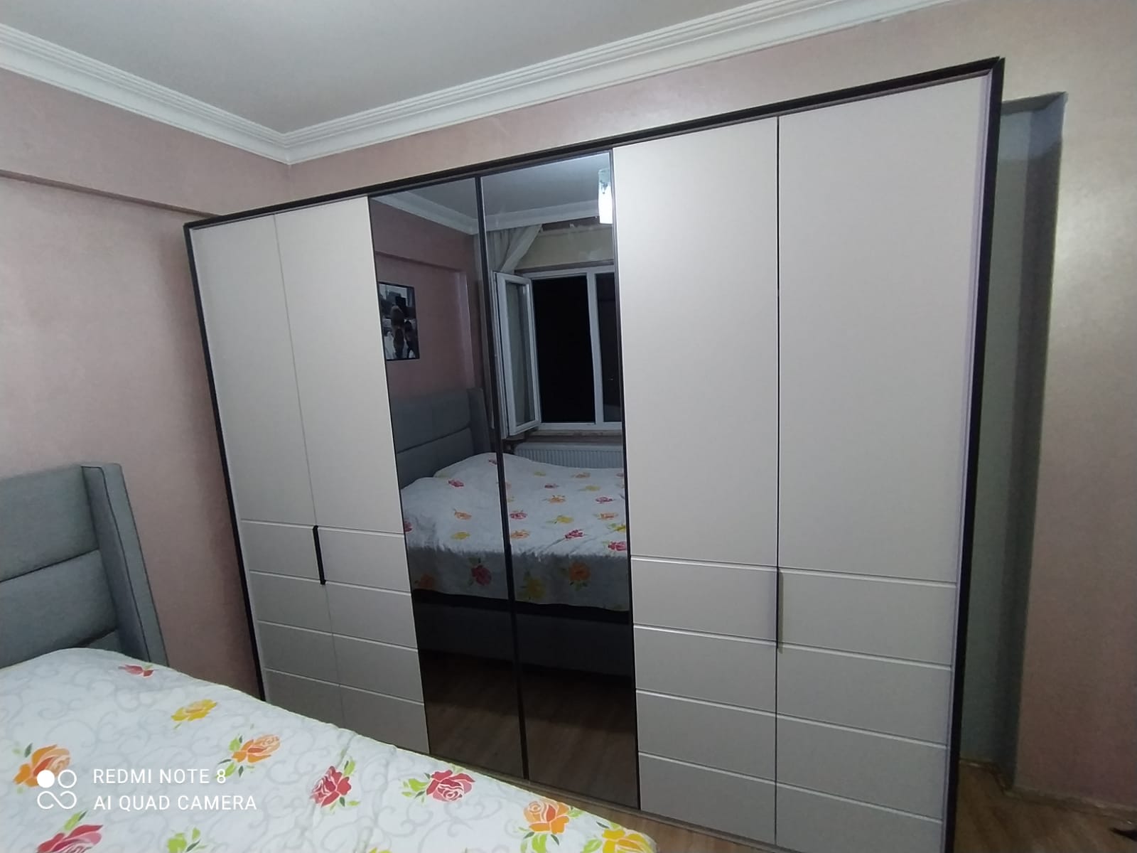 Stylish and functional mirrored wardrobe, offering ample storage and aesthetic design, reflecting Inegol furniture quality. Ideal for bedrooms.