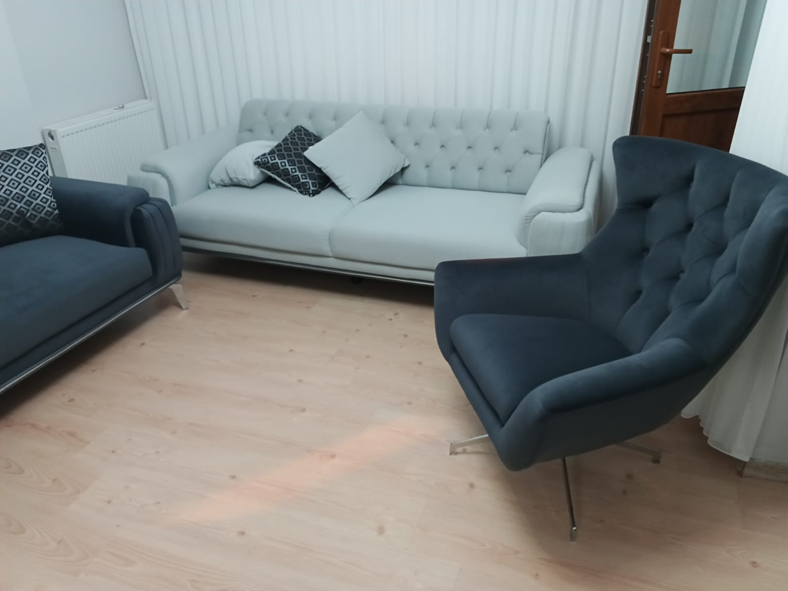 Modern grey sofa set featuring a Chesterfield sofa and armchair, designed for Neriman Yerlikaya - Kocaeli. Affordable Inegol furniture with stylish comfort.