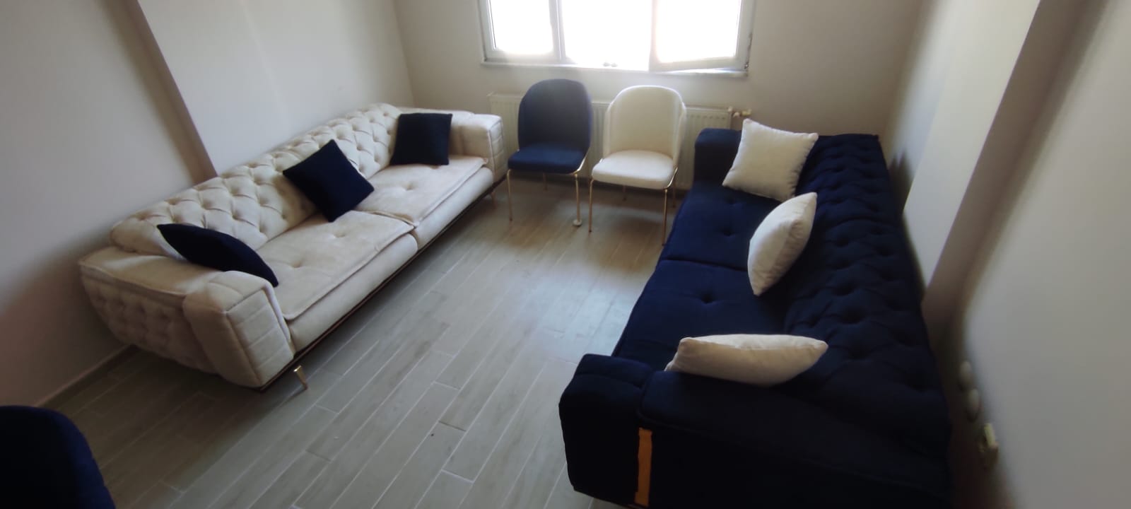 Şakir Yılmaz Balıkesir modern chesterfield sofa set with beige and navy velvet sofas, gold detailed chairs. Inegol furniture prices.