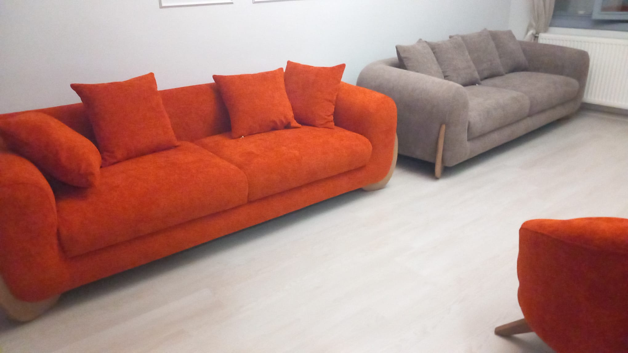 Modern orange and beige sofa set from the Şerife Gök - Konya collection, featuring comfortable design for stylish living spaces. Explore Inegol furniture prices.