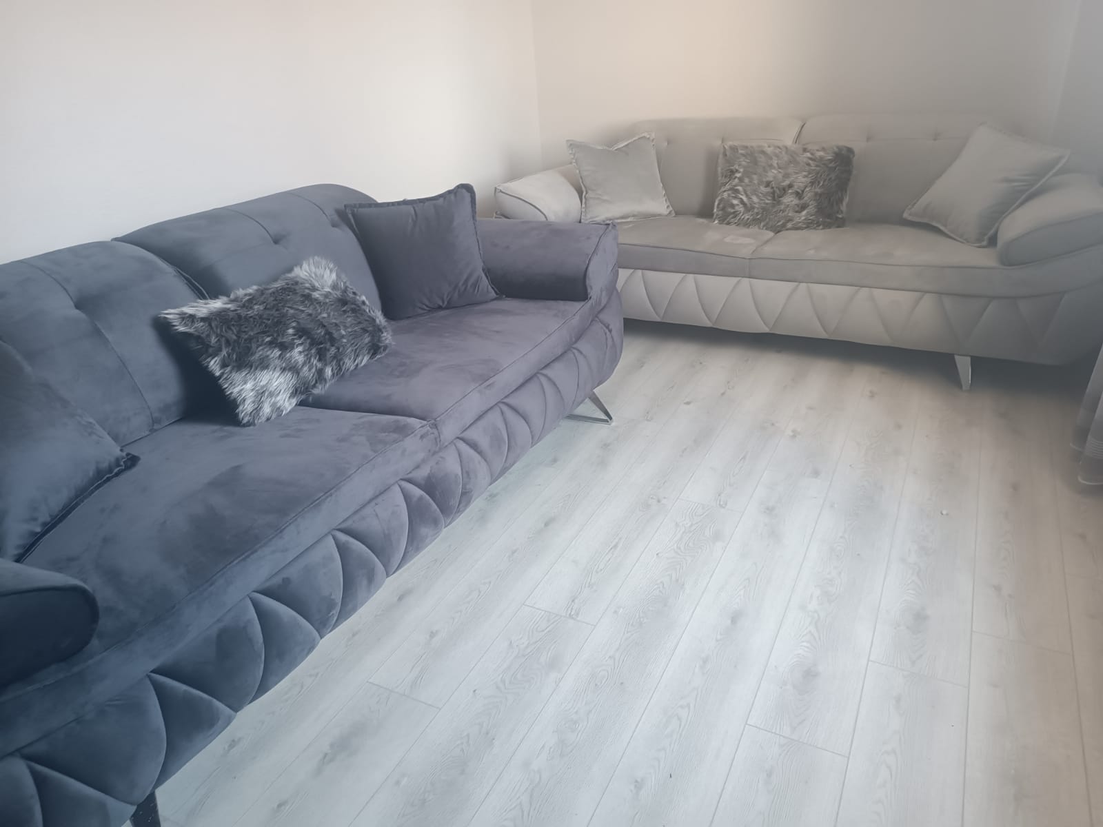 Elegant modern grey velvet sofa set with unique quilted design. Experience Bursa furniture quality in your living space.