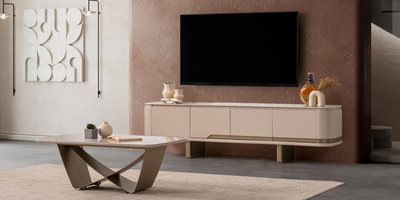 Modern salon dekorasyonunda yerini alan, krem rengi ve yuvarlak hatlara sahip Vita TV Ünitesi. Şimdi inegöl mobilya kampanyaları ile keşfedin.