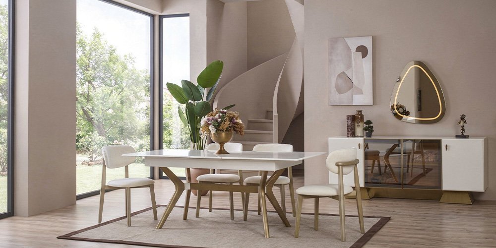 Modern and elegant Asel Dining Room Set featuring a white marble-look table and chairs with golden metal legs. Bursa furniture quality for stylish homes.