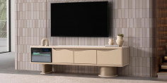 Aura Tv Ünitesi, krem rengi, kavisli modern tasarımı ve fonksiyonel depolama alanları ile dikkat çekiyor. Modern inegol mobilya kalitesiyle evinize şıklık katın.