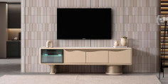 Aura Tv Ünitesi, krem rengi, kavisli modern tasarımı ve fonksiyonel depolama alanları ile dikkat çekiyor. Modern inegol mobilya kalitesiyle evinize şıklık katın.
