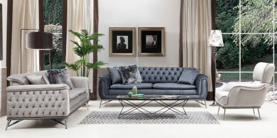 Modern tasarımlı Diamond Koltuk Takımı, gri ve lacivert chesterfield tarzı kanepeleriyle dikkat çekiyor. Salonunuz için inegöl mobilya kampanyaları fırsatıyla bu şık takımı keşfedin.