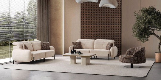 Krem rengi Leon Koltuk Takımı, iki modern kanepe, desenli berjer ve sehpa ile zarif bir salon. En cazip inegöl mobilya kampanyaları.