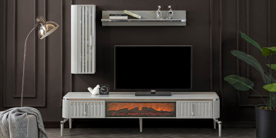 Şömineli modern Bianca Tv Ünitesi, metal ayaklı ve beyaz/gri tonlarda, Modern inegol mobilya stilini yansıtan zarif bir oturma odası çözümü.