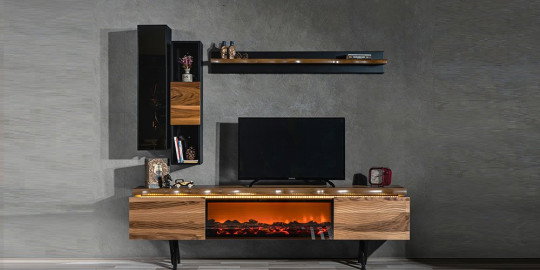 Şömineli, ceviz dokulu ve siyah detaylı modern Greenwich TV Ünitesi. İnegöl mobilya kalitesiyle evinizin atmosferini değiştirin.