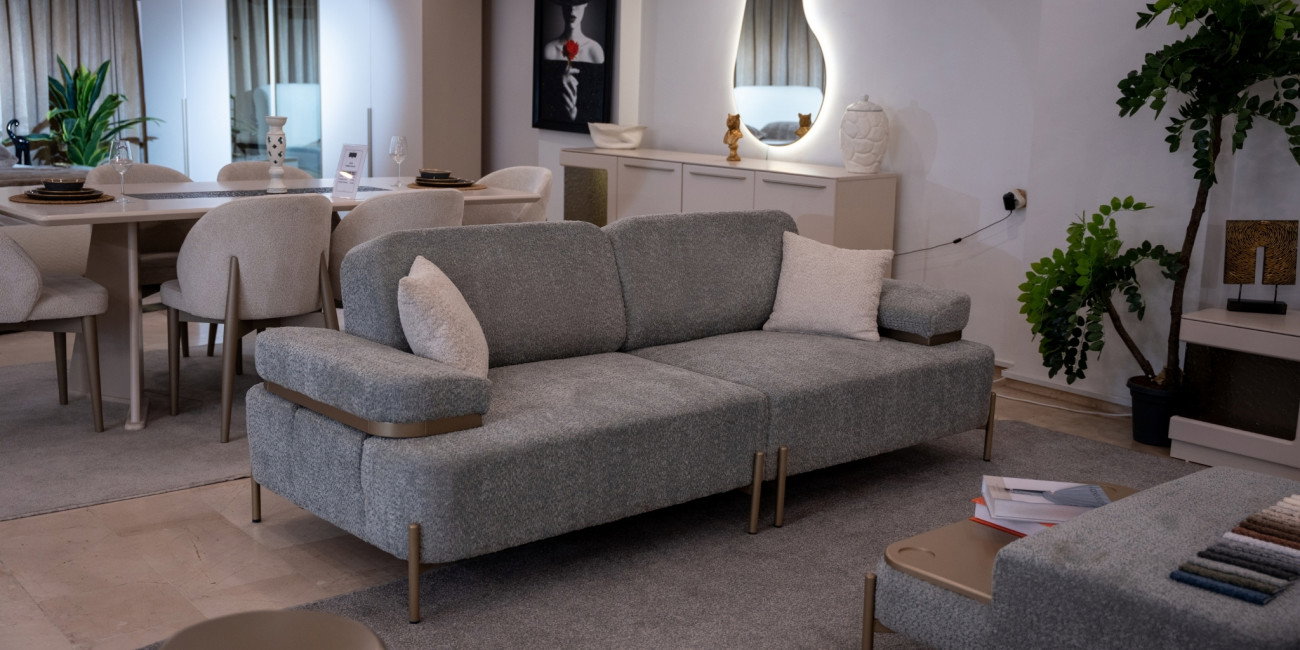 Modern Duru koltuk takımı, gri ve bej tonlarında döşemeli kanepeler, berjer ve sehpalı puf ile uygun fiyatlı inegöl mobilya seçeneği.